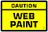 Mini cartel que indica que hay que tener cuidado porque hay 'pintura web'